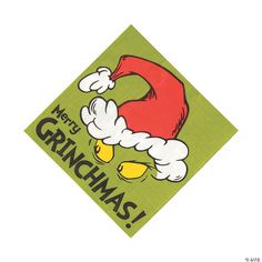 a green napkin with an image of a santa hat on it and the words merry grinmas