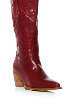 Meet your new go-to bootie! The AZALEA WANG Flint Red Cowboy Bootie is a fabulous faux leather style featuring a rounded mid-calf shaft, a pointed toe silhouette, a chunky stacked heel, side pull tabs, and a pull-on fit. Complete with tonal embroidered detailing. Pairs perfectly with denim and faux leather pieces. (all measurements approximate from a size 7.5) - Faux Leather Upper - Pointed Toe - Chunky Heel - 12” Shaft Height - 2.75” Heel Height - 12.75” Calf Circumference - 14.5” Shaft Opening Circumference - Imported Product ID: 384548 Azalea Wang, Leather Style, Leather Pieces, Stacked Heel, Chunky Heels, Leather Fashion, Mid Calf, Bootie, Heel Height