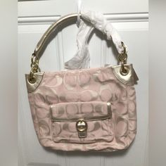 Nwt Coach Penelope Pearl Signature Buckle Hobo Bag. F18875. Bag Still Has Paper On Hardware And Handle From Shipping. Gold Hardware, Interior Has One Zip Pocket And Two Slip Pockets Outside Has Snap Pocket On Front And Zippered Pocket On Back Coach Pink Top Handle Shoulder Bag, Pink Top Handle Coach Shoulder Bag, Pink Double Handle Hobo Bag With Detachable Handle, Chic Pink Pouch Hobo Bag, Luxury Pink Rectangular Hobo Bag, Luxury Pink Top Handle Hobo Bag, Pink Luxury Hobo Bag, Coach Pink Pouch Shoulder Bag, Coach Pink Shoulder Bag With Detachable Strap