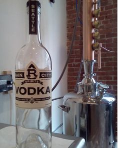 a bottle of vodka sitting on top of a counter