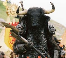 an image of a bull with horns and armor