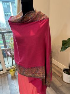 This Kashmiri pashmina shawl is super soft and is a perfect gift to own or for a return favor. The shawl is around 2.15 m in length and is a pink shade. Bordered with paisley motifs, the shawl is great for all seasons and of course for the winter. Can be worn on sarees as well. Beautiful Kashmiri pashmina shawls with paisley weaving | pashmina stole | pashmina scarf | return gift | favors | pashmina shawl online shopping | indian ethnic | gift for her | Kashmiri shawls Paisley Motifs, Kashmiri Shawls, Stole Scarf, Return Gift, Pink Shade, Pashmina Shawl, Pashmina Scarf, Shawls And Wraps, Scarf Wrap