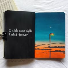 an open notebook with the words i wish some nights later written on it and a lamp post