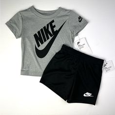 This Is Nike Infants Toddler 2 Piece Set T Shirt & Shorts Boy’s New Brand New 100% Authentic -Size: Size 24 Months -Condition: Brand New With Tag Retail: $36.00 Colors May Appear Lighter/Darker Due To Monitor Pixel Variations Casual Cotton Sets With Logo Print, Gray Playwear Sets For Summer, Sporty Graphic Print Sets For Playwear, Sporty Graphic Print Playwear Set, Sporty Playwear Set With Graphic Print, Gray Cotton Streetwear Sets, Sporty Playwear Sets With Letter Print, Nike Sets With Letter Print And Short Sleeve, Gray Sporty Tops For Playwear