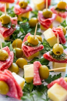 small appetizers with olives, cheese and parsley