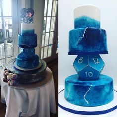 a blue and white cake sitting on top of a table next to an image of a clock