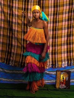 Cynthia Abila Okoroshi Skirt – Industrie Africa Multicolor Long Skirt For Evening, Bohemian Long Skirt For Evening, Raffia Crafts, African Luxury, Lagos Fashion Week, Waste Reduction, Feather Skirt, African Fashion Modern, African Dresses