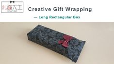 a gift wrapper with a red bow on it