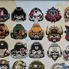 a bunch of stickers on the back of a wall with different types of skulls