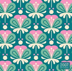 a blue and pink wallpaper with large flowers on the front, in different colors