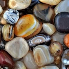 many different colored rocks and pebbles together