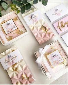 pink and gold wedding stationery with matching envelopes