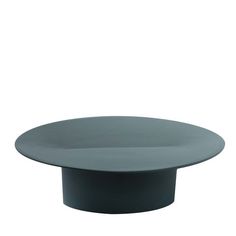 a gray plate sitting on top of a white table