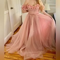 Size 8. Only Tried On Once, Never Worn Otherwise. I Really Loved It Online But Just Didn’t Enjoy The Fit! Hopefully You Can! Https://Www.Teutamatoshi.Com/Products/Peony-Princess-Off-Shoulder-Gown Details: -Blushed Rose Tulle Fabric -Off-Shoulder Embroidered Handmade Flowers -Corset With Built-In Pads And Boning -Draped Bodice -A-Line Silhouette -Flattering Wrap Skirt -Leg Slit -Floor-Length And A Court Train -Decorative Bow Ribbon Belt Pink Fantasy Dress, Teuta Matoshi Dresses, Matoshi Dress, Gown Details, Teuta Matoshi, Draped Bodice, Off Shoulder Gown, Aesthetic Dress, Princess Aurora