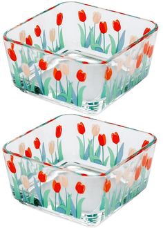 two glass dishes with tulips painted on them