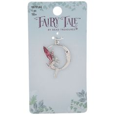 the fairy tale charm is shown on a card