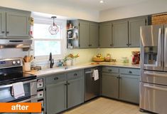 a kitchen with gray cabinets and stainless steel appliances