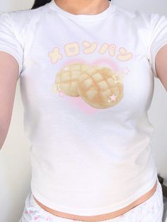 🍈 More Kawaii Fashion: https://www.etsy.com/shop/RainieshopDesign?section_id=45222503   PRODUCT DETAILS   ♡ Gildan Heavy Cotton™ Tee ♡ Made with 100% cotton ♡ Midweight fabric (5.3 oz/yd² (180 g/m ♡ Loose fit ♡ Sewn-in label ♡ Runs true to size  SIZING   ▸ Model is a regular size XS and is wearing a size XS baby tee for a fitted look. ▸ Please refer to the last picture with size chart for sizes and product dimensions.  ▸ Be aware that these shirts are baby tees that can have a snug fit if you c Y2k Anime Print Short Sleeve Top, White Harajuku Top With Funny Print, White Y2k T-shirt With Anime Print, White Y2k Anime Print T-shirt, Kawaii Graphic Print Summer Shirt, Kawaii Cotton Tops For Streetwear, Kawaii White Tops For Streetwear, Cotton Kawaii Tops For Streetwear, White Casual T-shirt With Cute Design