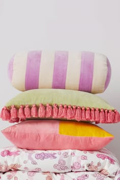 three pillows stacked on top of each other