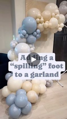 balloons are arranged in the shape of an arch with words reading adding a spelling foot to a garland