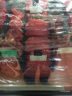 the meat is wrapped in plastic and ready to be bought at the store for sale