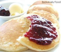 pancakes with jam and butter on a plate