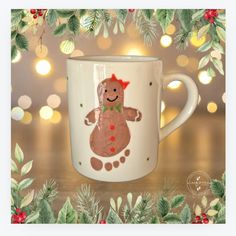 a christmas mug with a ginger bear on it