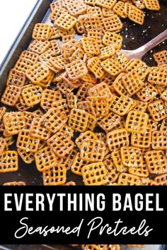 everything bagel seasoning pretzels in a baking pan with the words, everything bagel seasoning pretzels