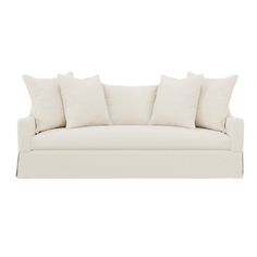 a white couch with four pillows on the back and one arm folded up to it's side