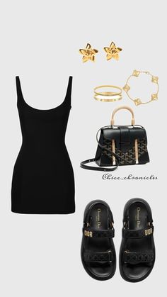 a black dress and sandals with gold accessories