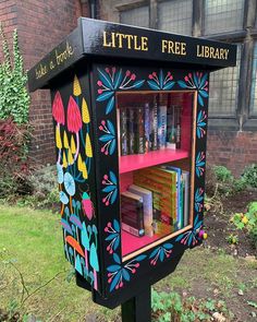 a little free library with books in it