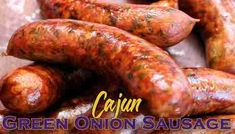 green onion sausages piled on top of each other with the words cajun written below