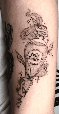 a woman's leg with a tattoo on it that reads, relax pelica