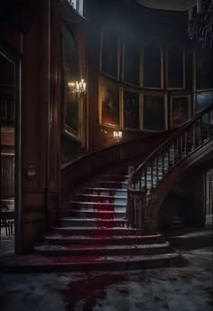 the stairs are covered with blood in this dark room, and there is also a chandelier hanging from the ceiling