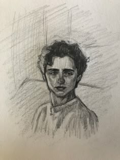 a pencil drawing of a young man's face