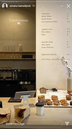 there is a table with food and drinks on it in front of the counter top