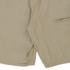 Vintage Avirex beige shorts, fit a 34" waist and 12" inseam. WAIST: 34 inches / 86cmsINSEAM: 12 inches / 30cmsRISE: 12.5 inches / 32cmsGENDER: mens CONDITION: very good.STYLE: shortsERA: 1990sCOLOUR: beigeFABRIC: cotton Cheap Beige Cotton Cargo Shorts, Vintage Cotton Khaki Shorts, Affordable Cotton Shorts With 5-inch Inseam, Beige Shorts