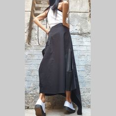 "Asymmetric long black skirt🤩 Extravagant designs and high quality fabrics. The item from the pictures is size S For more information feel free to ask questions. Material &Care Cotton textiles end polyester Hand wash at low temperatures Do not machine dry Do not iron Do not dry clean Sizing We make size from xs to 5xl as well as customized measures.So don't hesitate to contact us and make one for you. 🛫🎁Shipping🎁 🛬 STANDARD SHIPPING Europe : 6-8 business days USA&Canada : 8-10 busin Asymmetrical Black Flowy Maxi Skirt, Black Full-length Relaxed Skirt, Black Full-length Lined Maxi Skirt, Black Non-stretch Full Maxi Skirt, Black Asymmetrical Voluminous Maxi Skirt, Long Black Skirt, Cotton Textiles, Long Skirt Casual, Comfortable Skirts