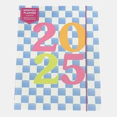 a blue and white checkered notebook with the number twenty five on it's cover