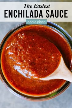 the best enchilada sauce is in a jar with a wooden spoon