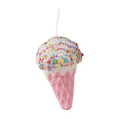 an ice cream sundae with sprinkles and candy on it's top