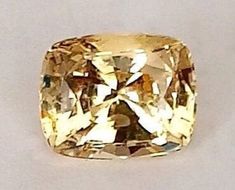 This Ceylon Yellow Sapphire is Untreated and Unheated. Sourced directly from the Local miners in Sri Lanka.  This rare cushion cut Yellow Sapphire has a beautiful natural colour and exceptional luster to it and most importantly has no treatments at all. An Unheated Yellow Sapphire from Sri Lanka well cut and polished.  The stone has not received any chemical treatments. NOT a lab created or a cultured stone. Gemstone - Natural Yellow Sapphire Weight - 1.55 Cts Measurement - 7.2×5.8×4.4mm Cut - Cushion Cut  Clarity - Eye clean to Loupe clean  Colour - Vivid Yellow  Luster - Full  Treatments - None/Untreated  Origin - Sri Lanka 100% Natural Gemstone.  This piece is excellent for a White Gold mounted Solitaire Ring or with Diamonds. Halo Yellow Sapphire diamond Ring.  Loose Gemstone for jewel Cultured Stone, Pink Spinel, Sapphire Diamond Ring, Yellow Sapphire, Red Fire, Sapphire Diamond, Cushion Cut, Custom Rings, Neon Pink