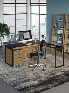 an office with a desk, chair and bookcase in front of a large window