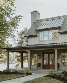 a house with a porch and covered patio