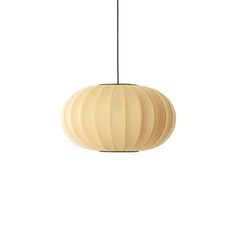 a wooden light fixture hanging from a ceiling