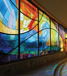 a large stained glass window in a building