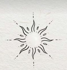 a black and white drawing of a sun