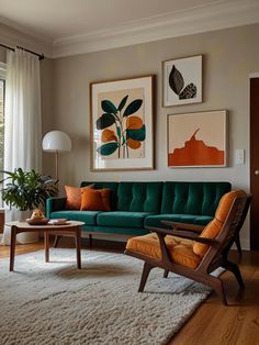 a living room filled with furniture and paintings on the wall next to a large window