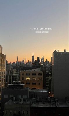 the city skyline is lit up at night with words above it that read woke up here