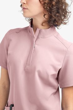 Blusas médicas a la moda en colores sólidos para mujeres en Uniform Advantage Plus Size Scrubs, Scrubs Fashion, Medical Scrubs Fashion, Scrub Suit, Medical Scrubs Outfit, Nursing Scrubs, More Flexible, Uniform Advantage